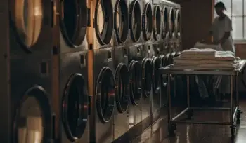 Clean, folded medical linens in a Herricks laundry facility.
