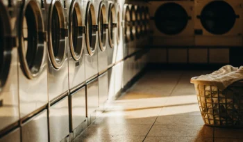 Row of modern washing machines at the best laundromat in Upper Brookville.