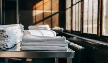 Professionally cleaned healthcare linen ready for delivery from a Centre Island provider.