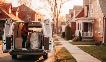 Laundry pickup service van on a residential street in Brookville.
