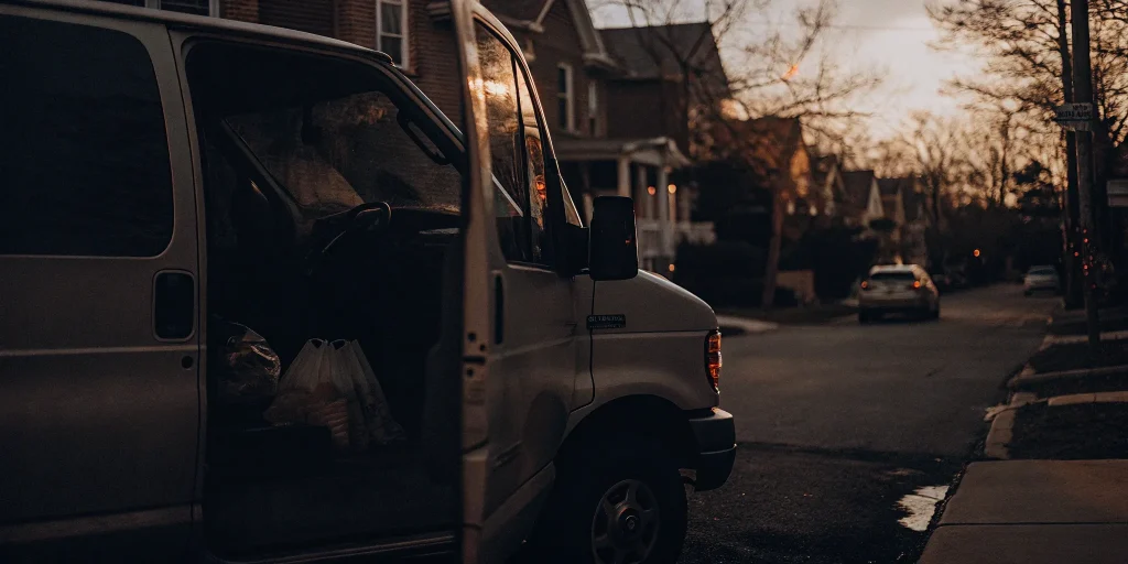 A laundry pickup service van making a stop in Rockville Centre.